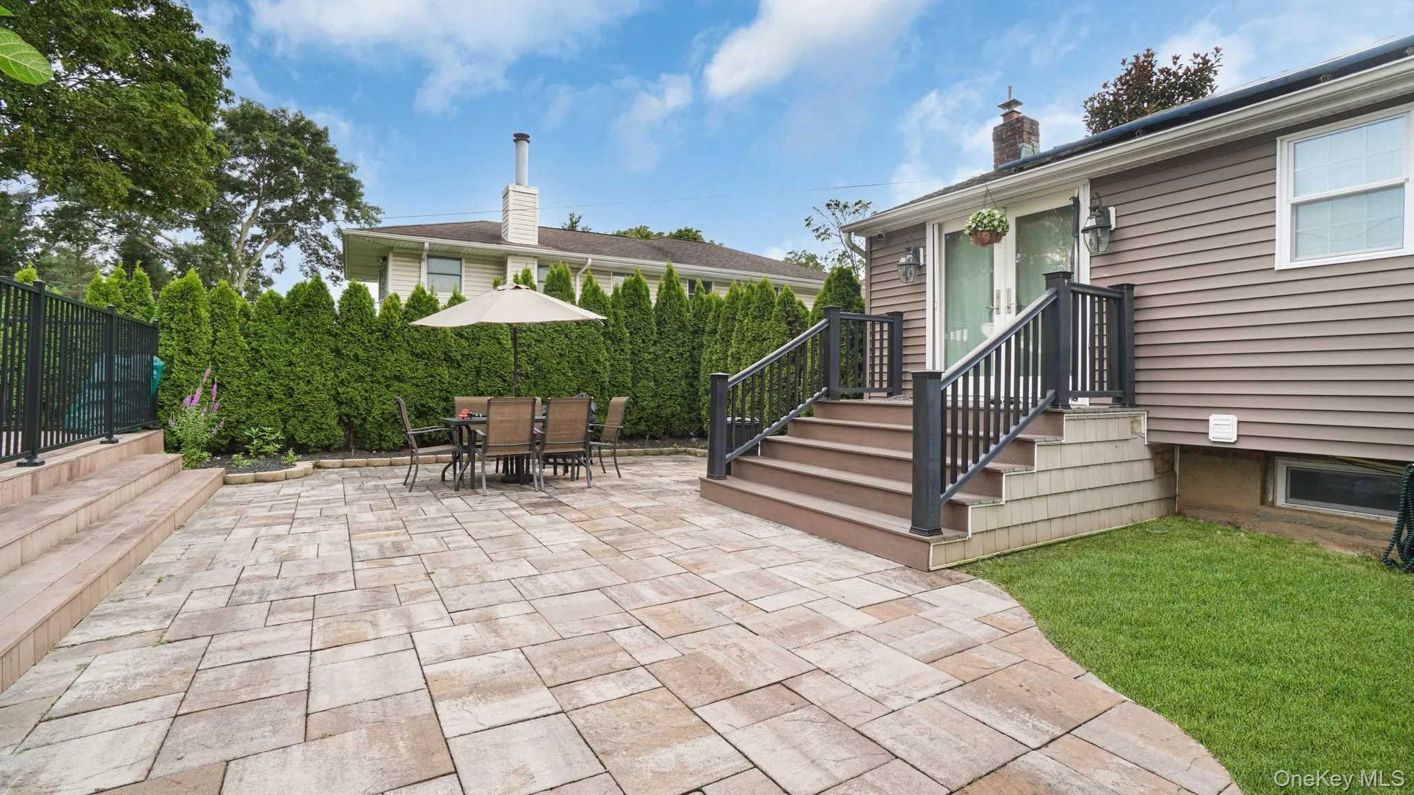 View of patio featuring outdoor dining space View of patio featuring outdoor dining space