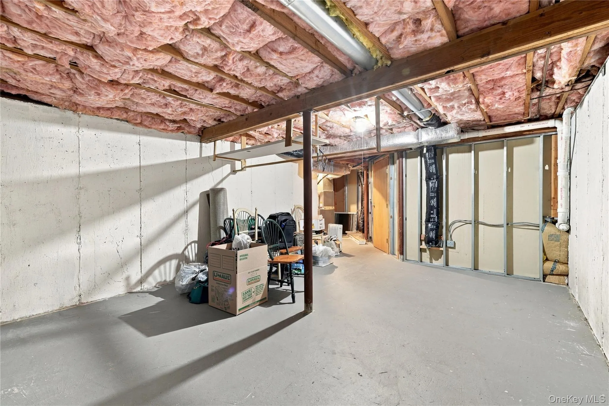 Unfinished area of basement for storage Unfinished area of basement for storage