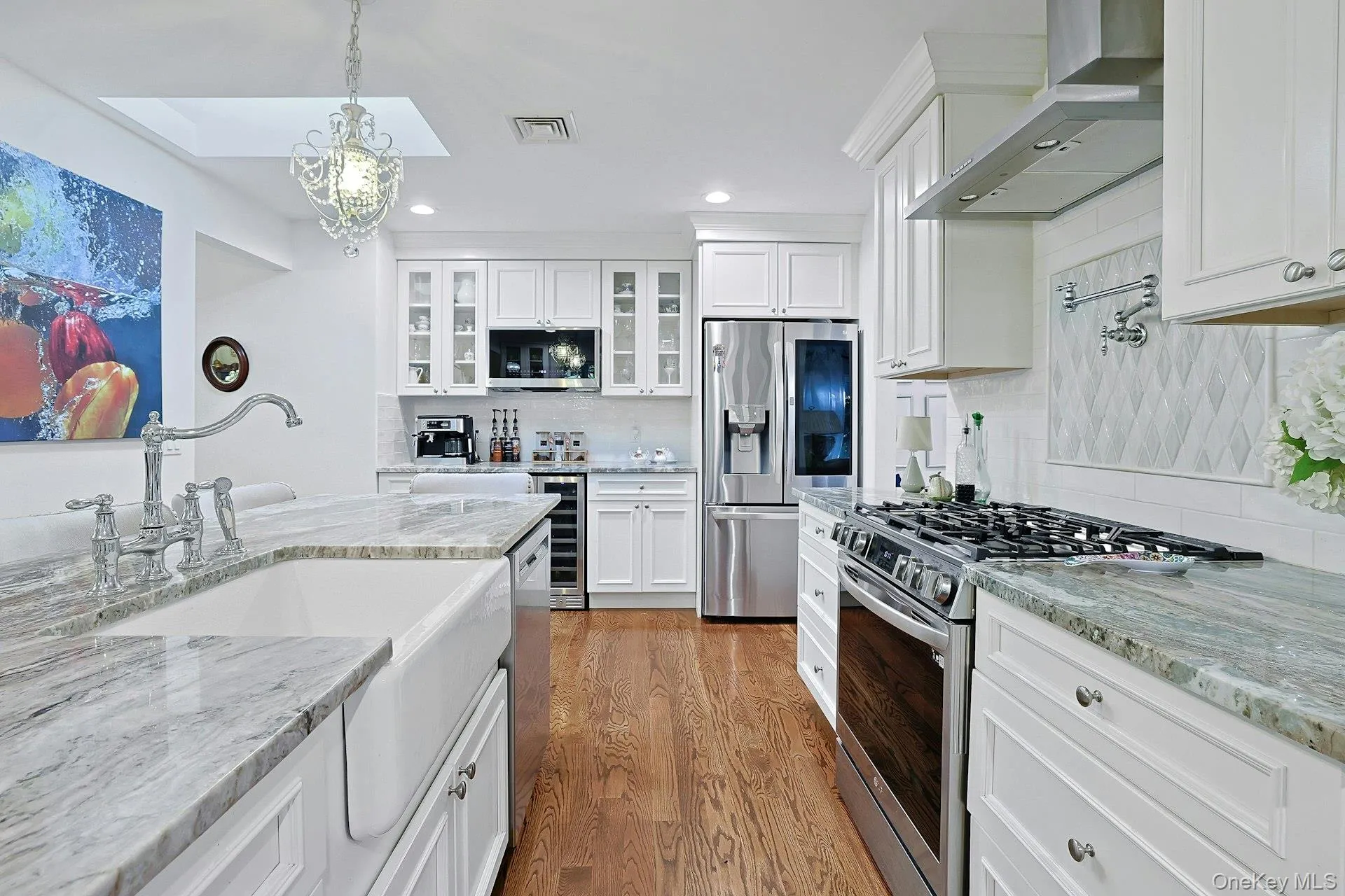 It's beautiful and complete with many special amenities ... Farmhouse sink, pot faucet at range, pendant lighting, skylight and more! It's beautiful and complete with many special amenities ... Farmhouse sink, pot faucet at range, pendant lighting, skylight and more!