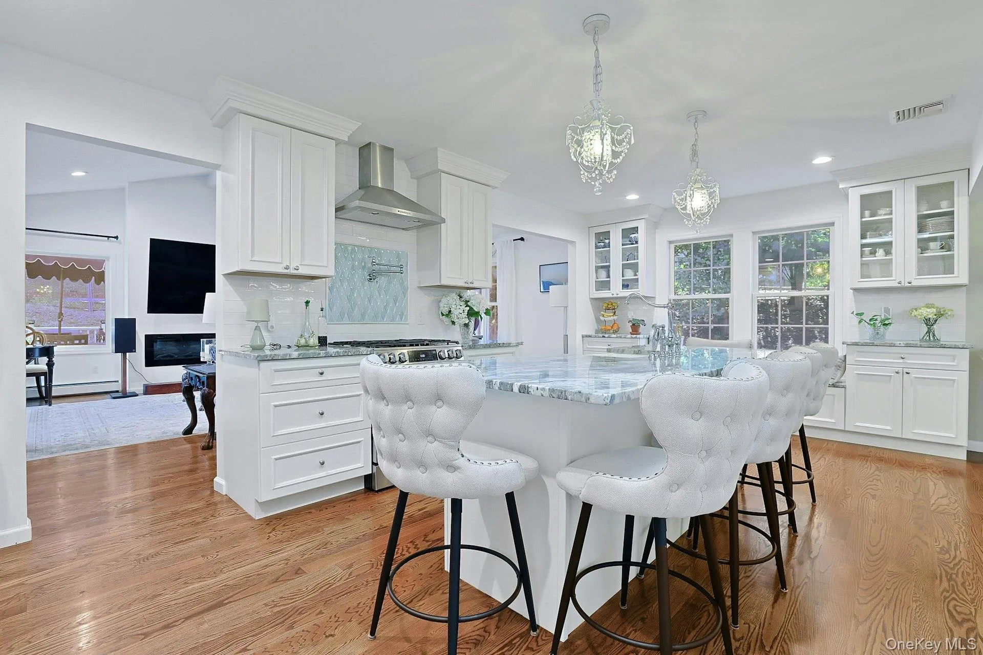 The Kitchen is the centerpiece of the living area with an open flow to the Dining Room at the front and the Great Room at the back. The Kitchen is the centerpiece of the living area with an open flow to the Dining Room at the front and the Great Room at the back.