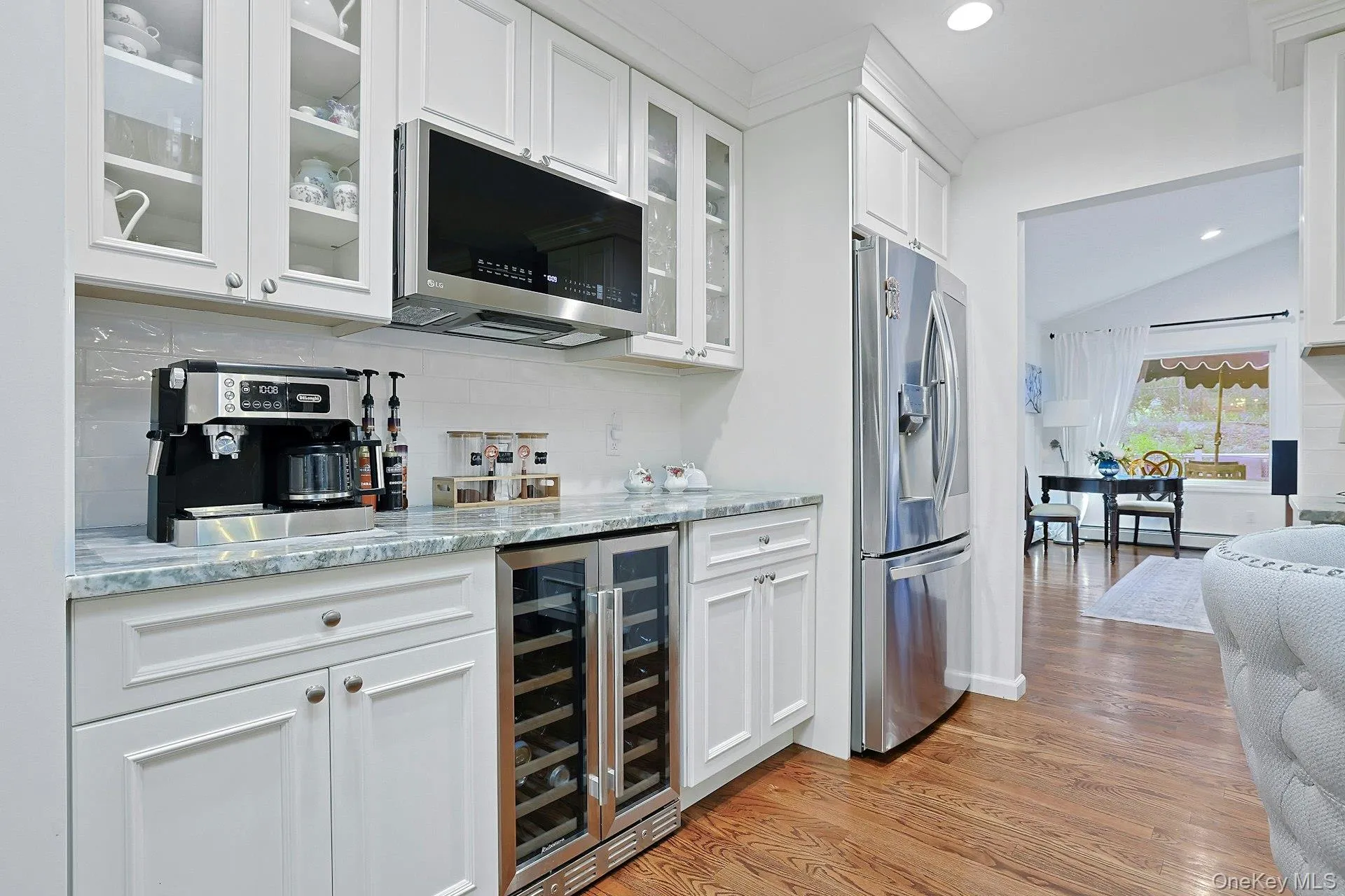 Stainless steel appliances, wine cooler and display cabinets. Stainless steel appliances, wine cooler and display cabinets.
