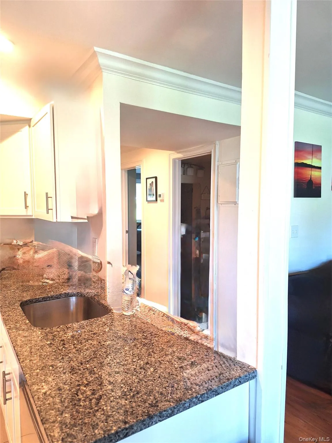 Kitchen opens into the living room and dining room. Plenty of light from the sliding glass doors as well. Kitchen opens into the living room and dining room. Plenty of light from the sliding glass doors as well.