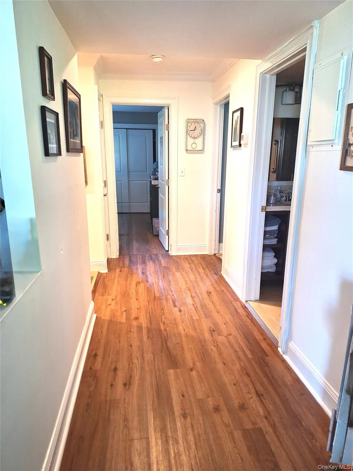 Nice wide hallway towards the two bedrooms and bathrooms and laundry. Nice wide hallway towards the two bedrooms and bathrooms and laundry.