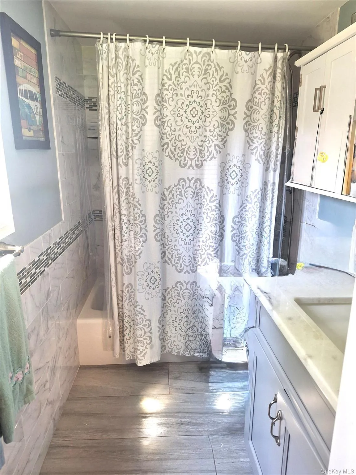 Updated bathroom in neutral colors. Updated bathroom in neutral colors.