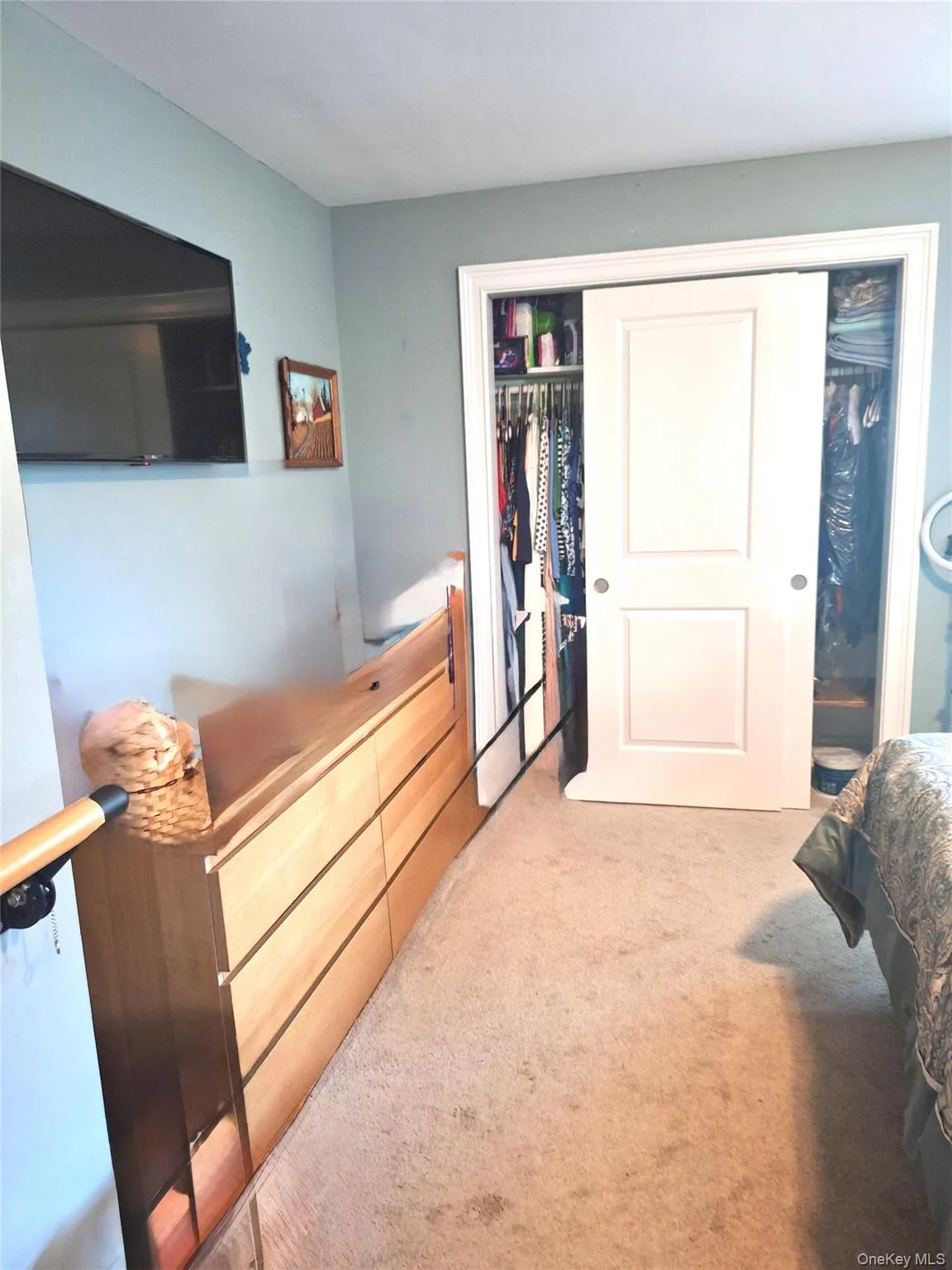 Another view of the larger bedroom with closet. Another view of the larger bedroom with closet.