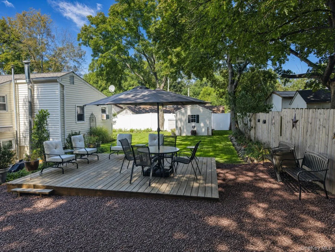 Beautiful back yard area with 2 levels o enjoy! Beautiful back yard area with 2 levels o enjoy!
