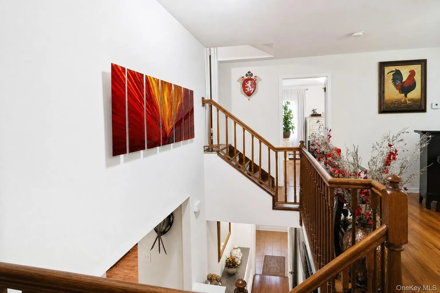 Open spindle staircase offers views of floors below~ Open spindle staircase offers views of floors below~
