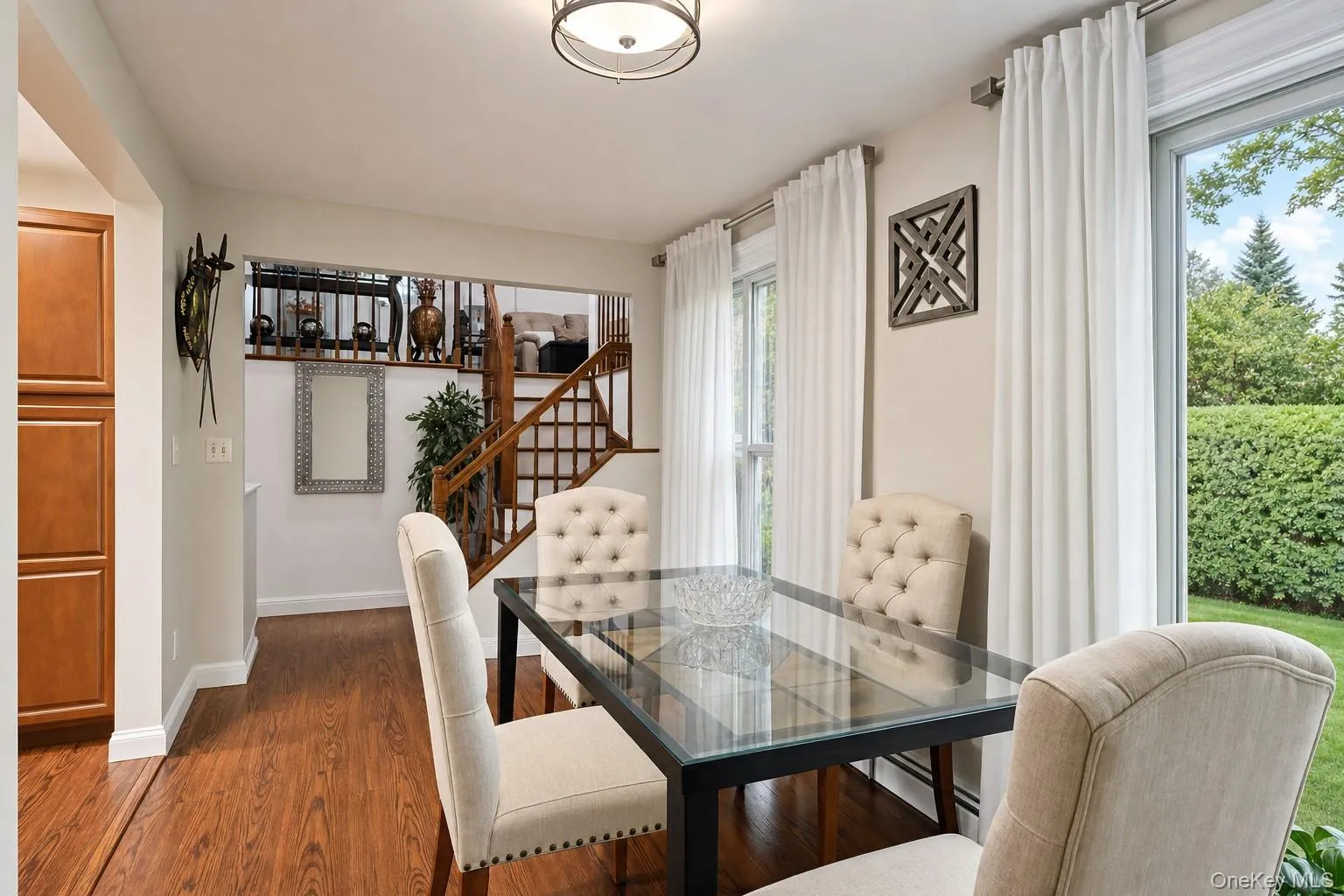 Lovely dining area with easy access to kitchen and beautiful back yard~ Lovely dining area with easy access to kitchen and beautiful back yard~