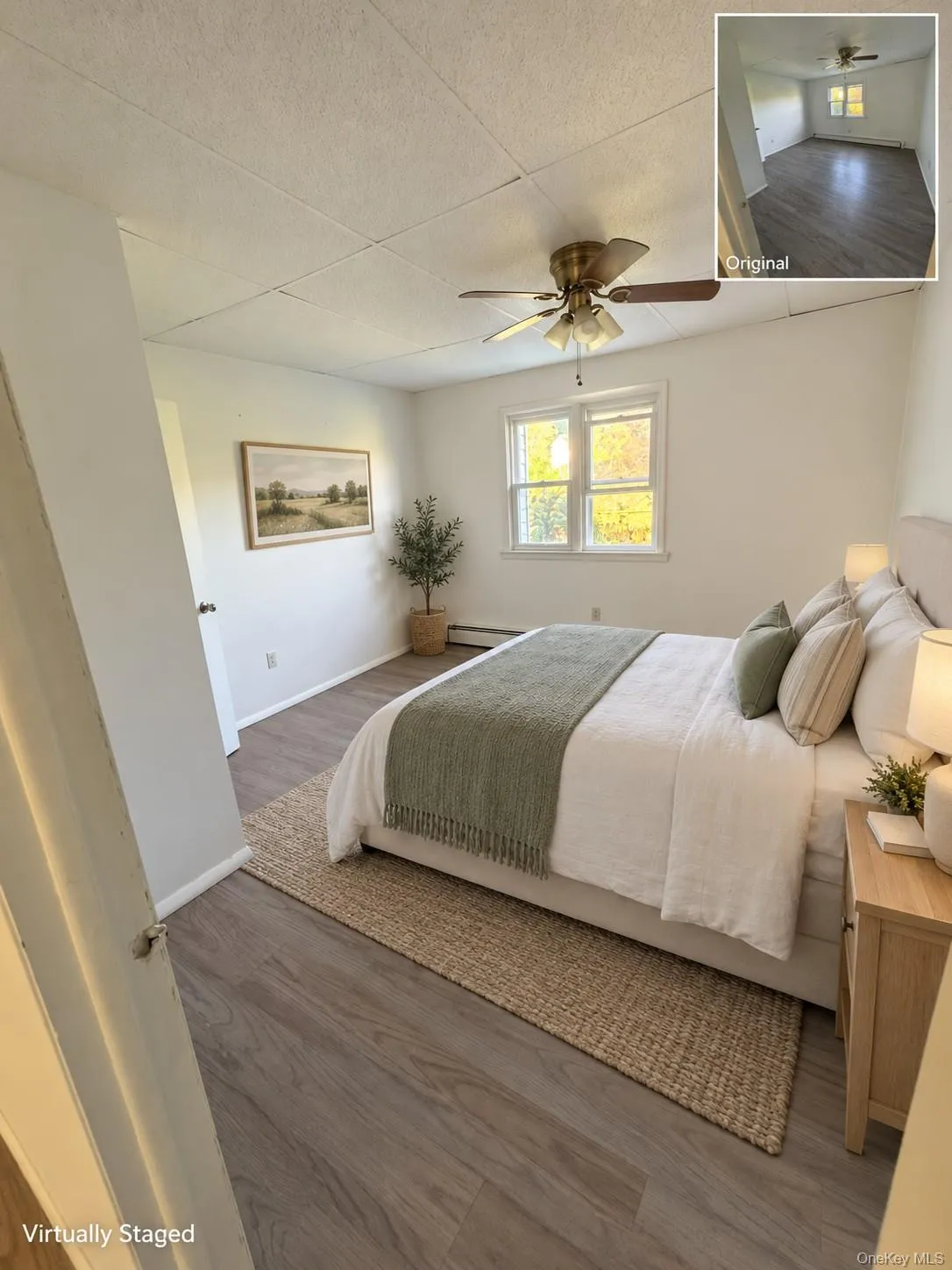 Wood-finish flooring, ceiling fan with integrated lighting, and multiple windows Wood-finish flooring, ceiling fan with integrated lighting, and multiple windows