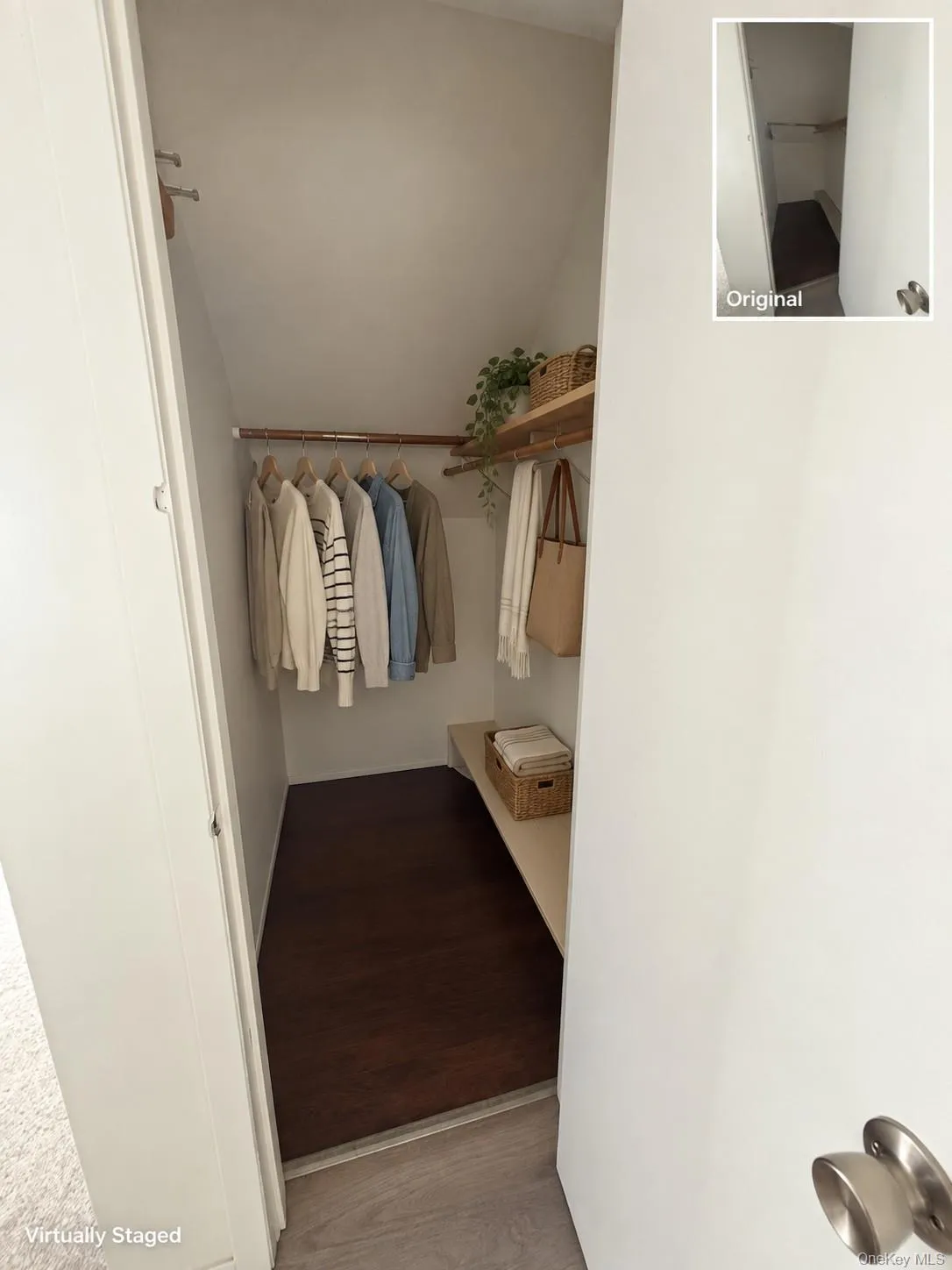 Built-in closet shelving, integrated hanging rod, and dark wood-finish flooring Built-in closet shelving, integrated hanging rod, and dark wood-finish flooring