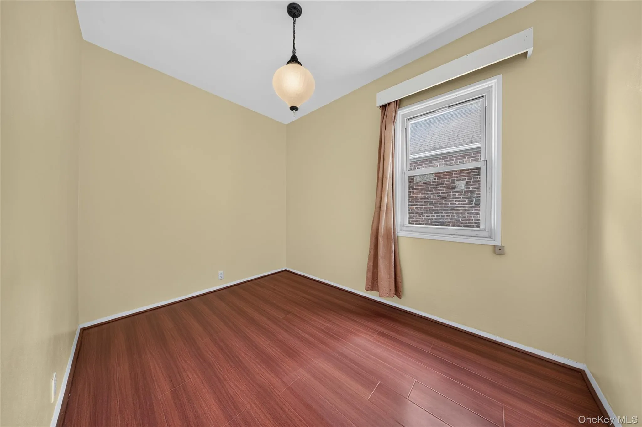 Wood-finish flooring with neutral wall tones Wood-finish flooring with neutral wall tones