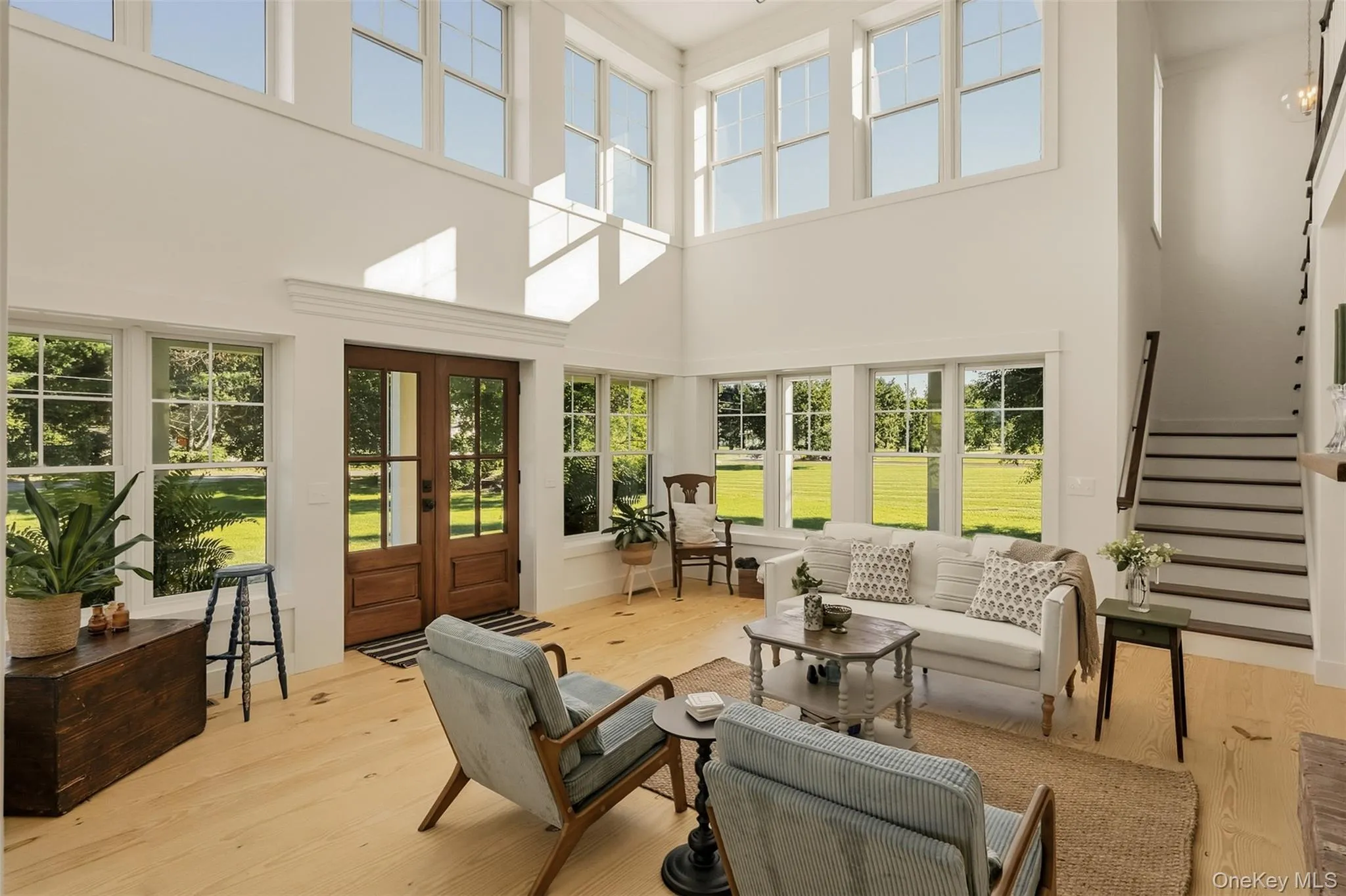 The abundance of windows washes the room with natural light, truly a special room with a warm and inviting energy The abundance of windows washes the room with natural light, truly a special room with a warm and inviting energy