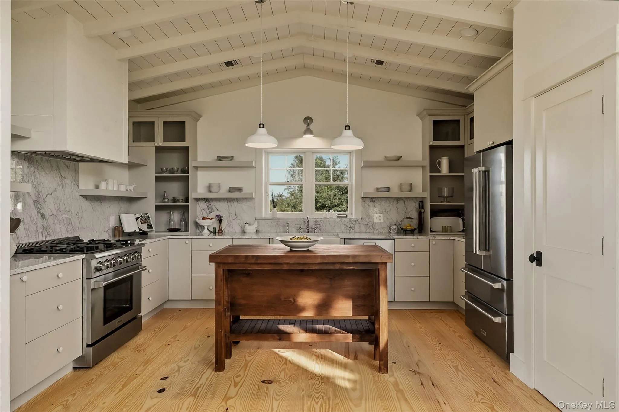 Aster wood island, carrara marble countertops, pewter cabinets and Thor appliances. But, my favorite feature is the wood ceilings. They are classic farmhouse. Aster wood island, carrara marble countertops, pewter cabinets and Thor appliances. But, my favorite feature is the wood ceilings. They are classic farmhouse.