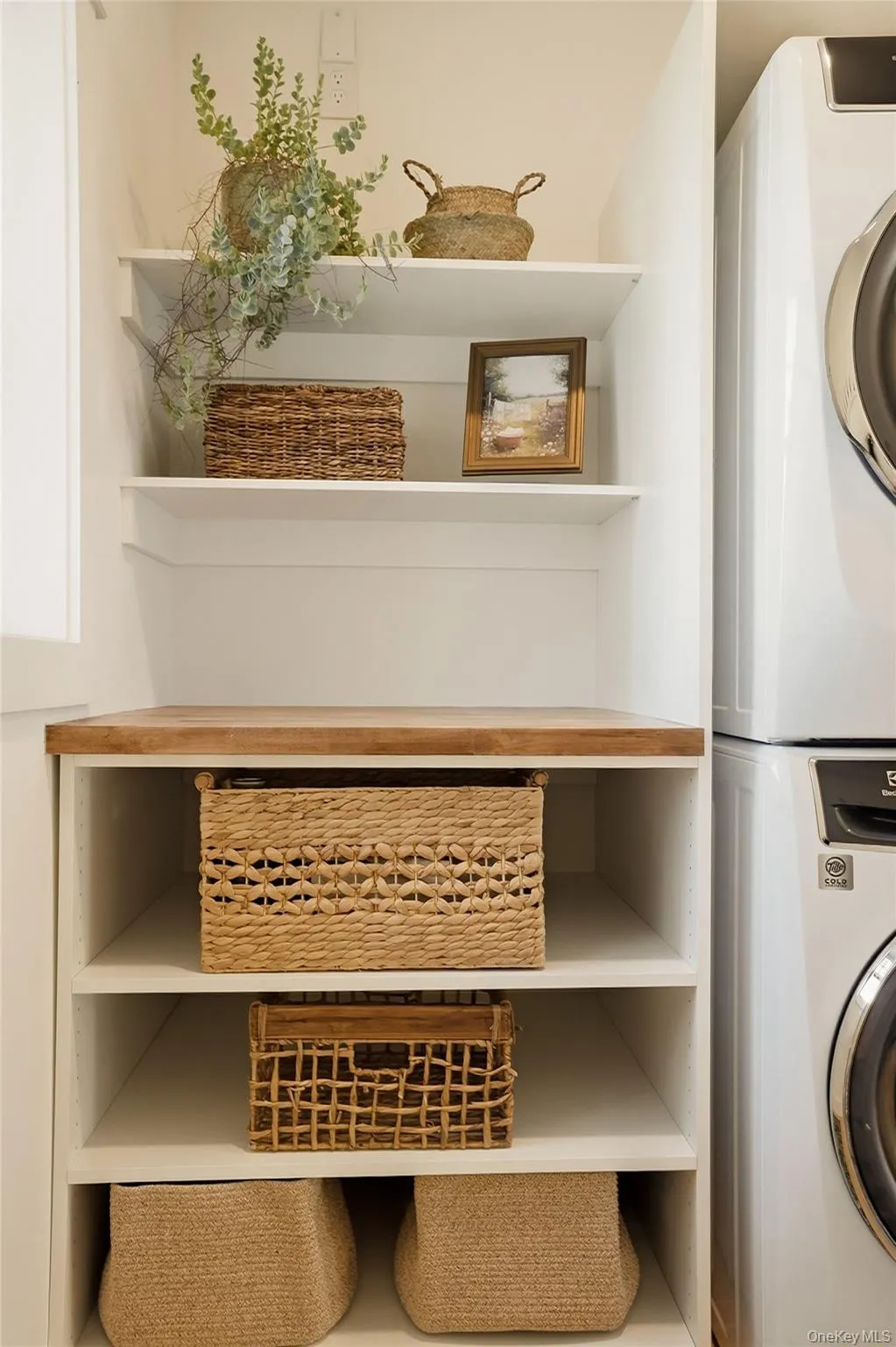 Folding counter and built in storage. Even the laundry room was designed with intention. Folding counter and built in storage. Even the laundry room was designed with intention.