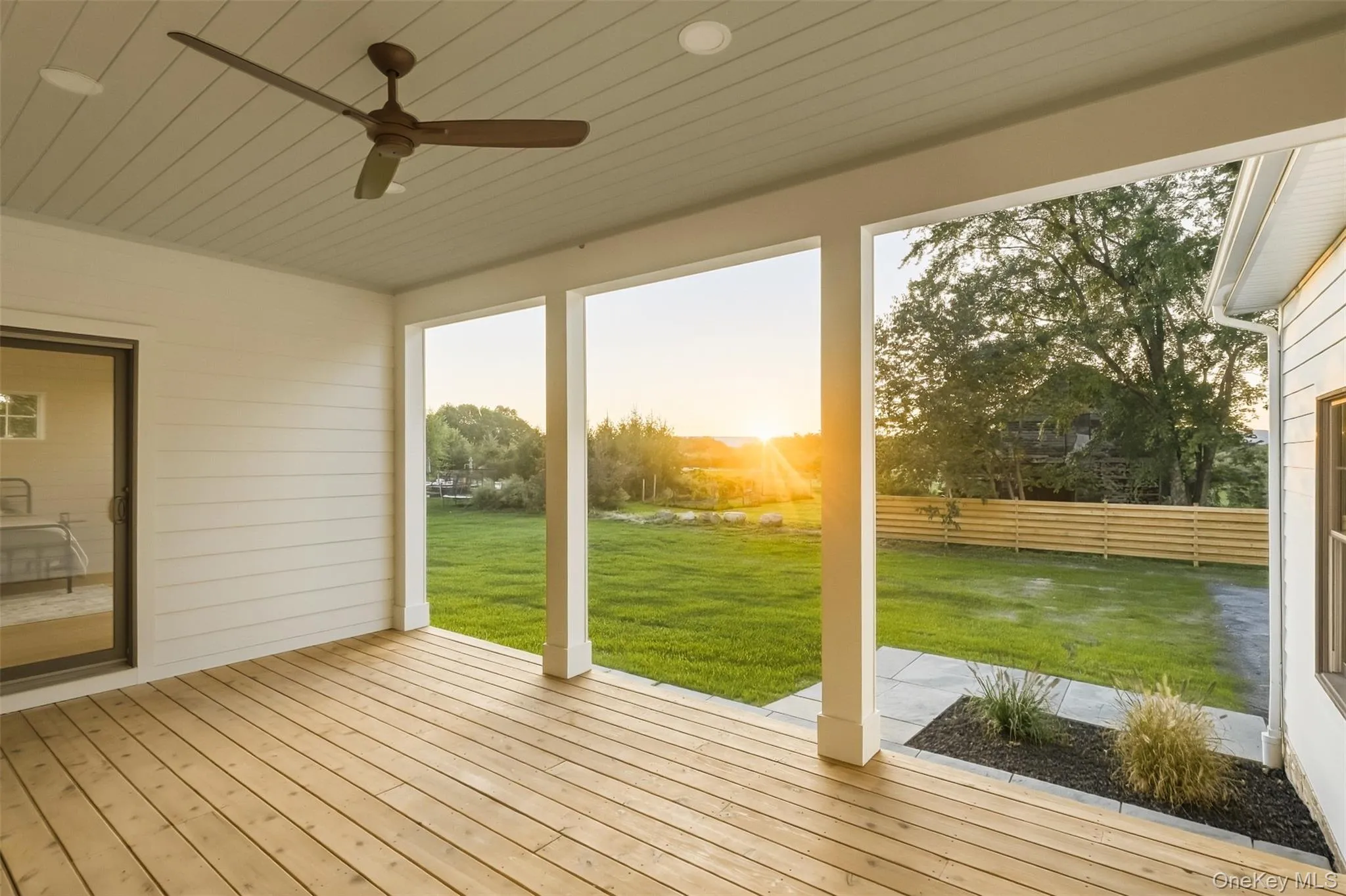 Covered back deck with bluestone patio. Overlooking the backyard and gold course. The perfect spot for your grill or hot tub. Covered back deck with bluestone patio. Overlooking the backyard and gold course. The perfect spot for your grill or hot tub.