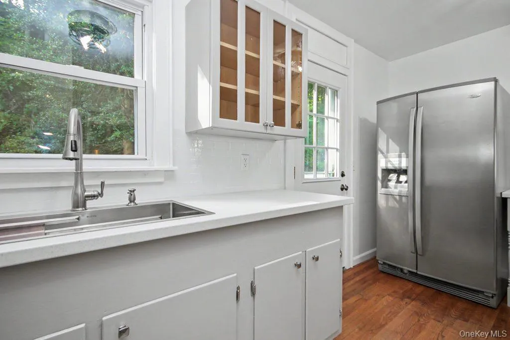Updated stainless sink and subway tile in Kitchen Updated stainless sink and subway tile in Kitchen