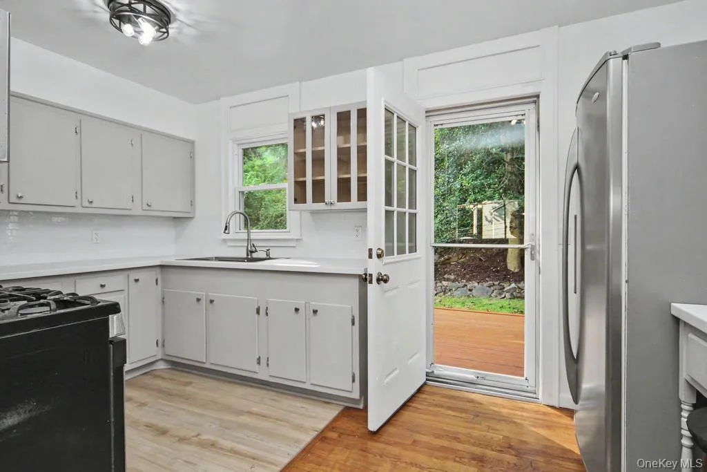 Kitchen has a door to deck Kitchen has a door to deck