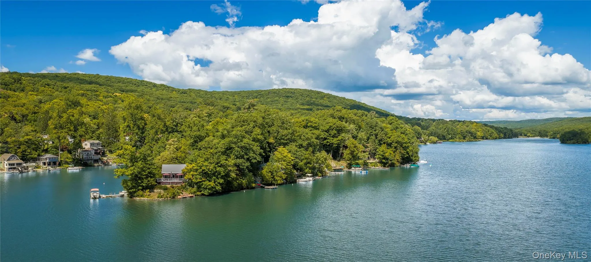 Set on a 4½-acre island with 16 individually owned cottage sites, this remarkable destination is accessible only by boat, creating an extraordinary sense of privacy and escape. Set on a 4½-acre island with 16 individually owned cottage sites, this remarkable destination is accessible only by boat, creating an extraordinary sense of privacy and escape.