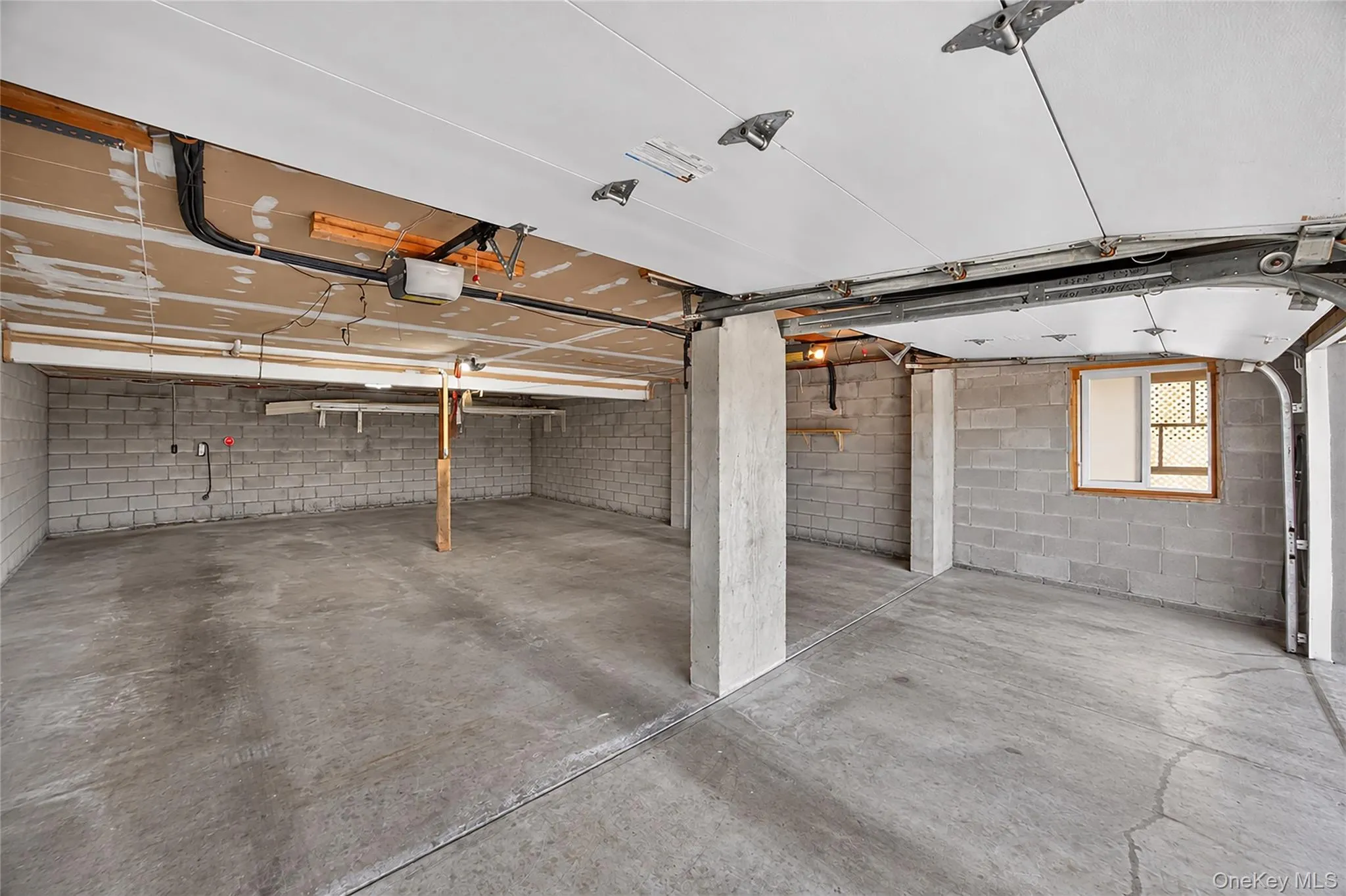 2 car garage with a 4 car garage depth. Edited photo 2 car garage with a 4 car garage depth. Edited photo
