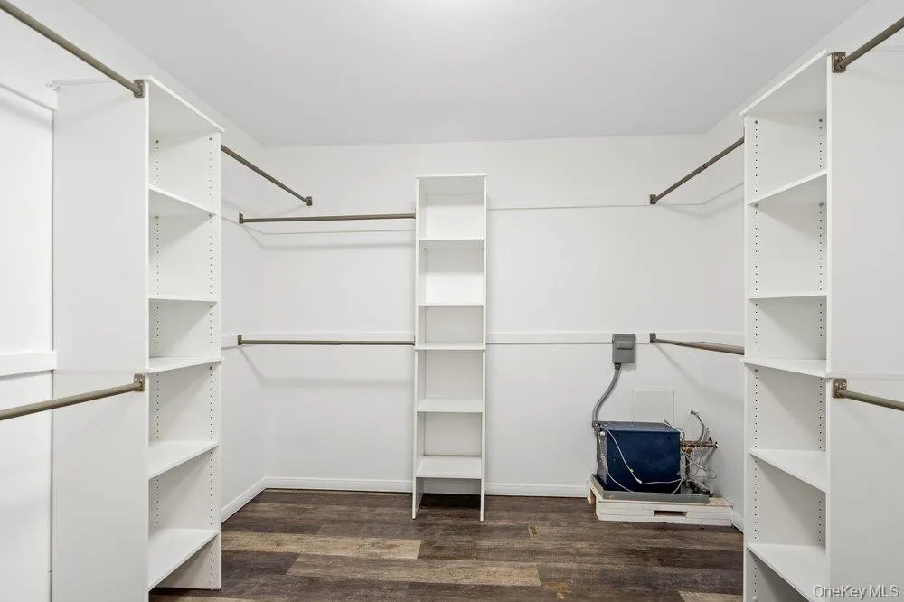 Built-in shelving, hanging rods, recessed lighting, wood-finish flooring Built-in shelving, hanging rods, recessed lighting, wood-finish flooring