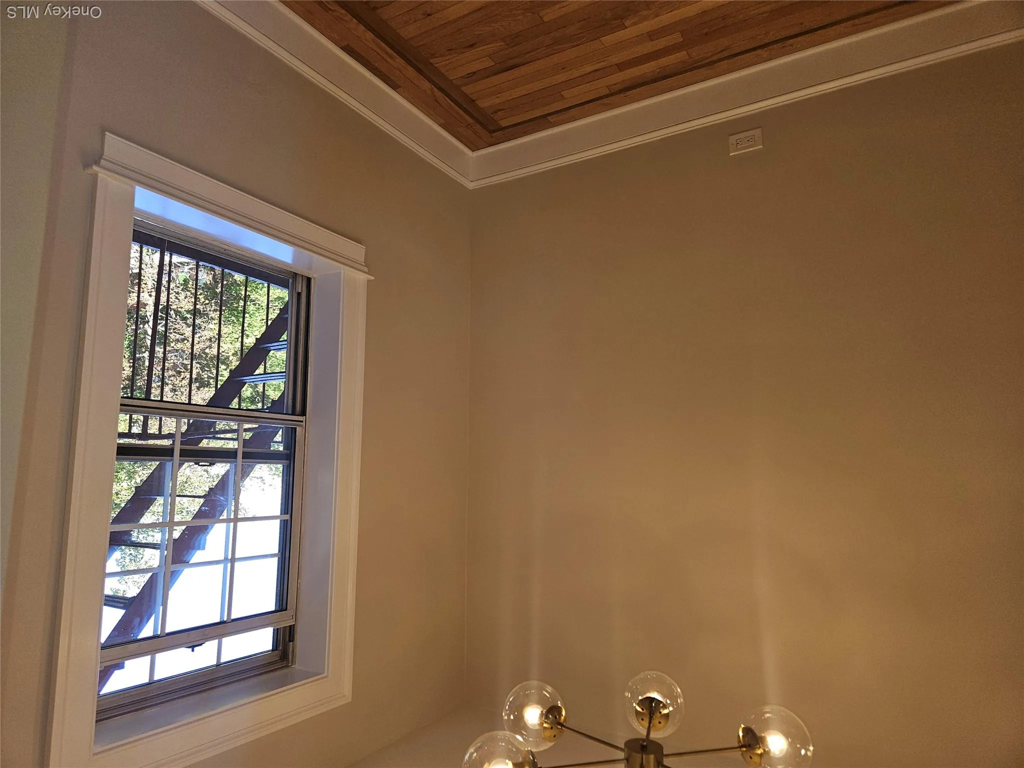 New trim and molding, glistening hard wood floor. New trim and molding, glistening hard wood floor.
