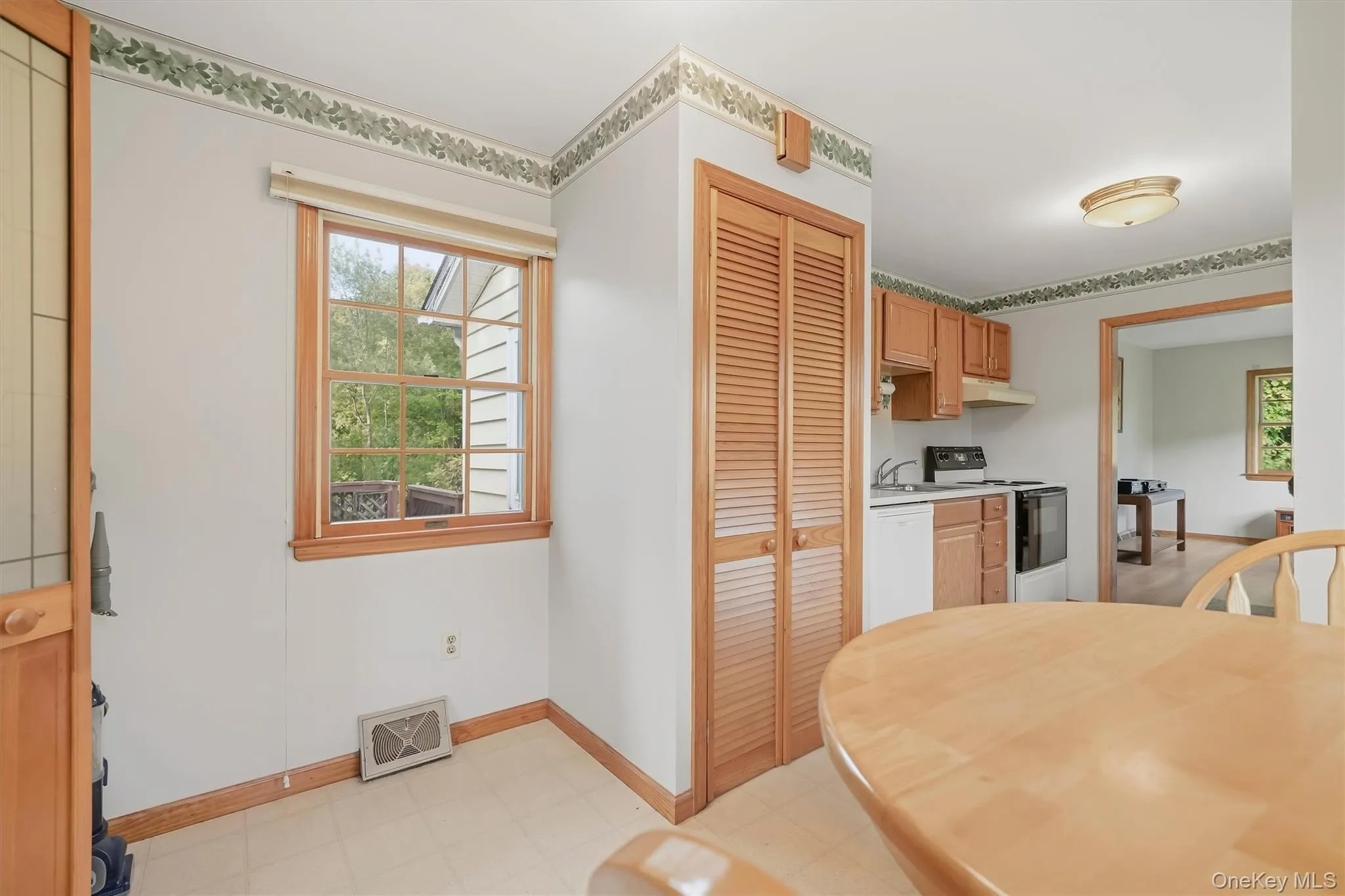 Dining area with a second nook to make use of. Dining area with a second nook to make use of.