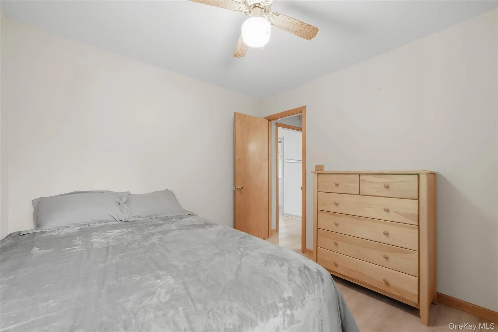 Light-toned wood-finish flooring with neutral wall tones Light-toned wood-finish flooring with neutral wall tones
