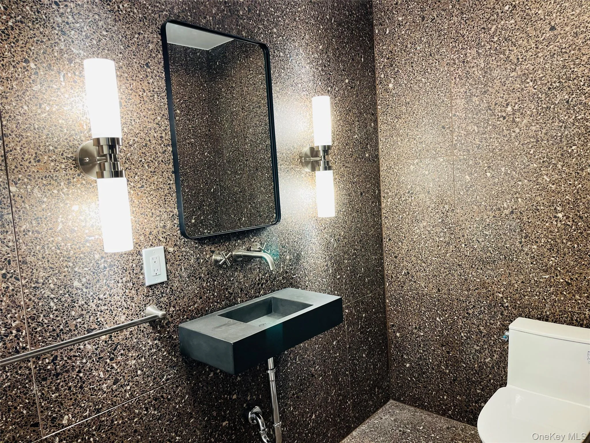 New sink, lighting, tile, toilet and mirror New sink, lighting, tile, toilet and mirror