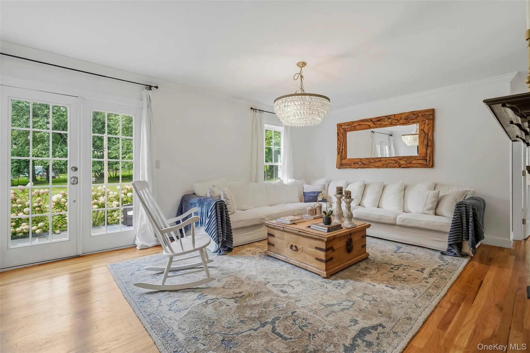 Sun drenched Family room with glass french doors that lead to backyard Sun drenched Family room with glass french doors that lead to backyard