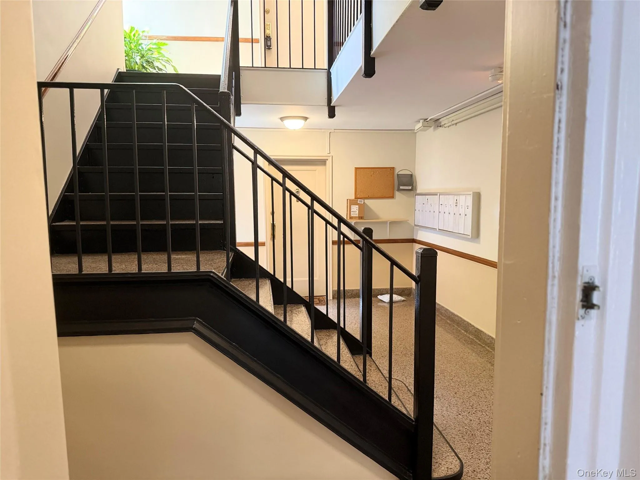 Pleasant first floor building T entry foyer. Pleasant first floor building T entry foyer.