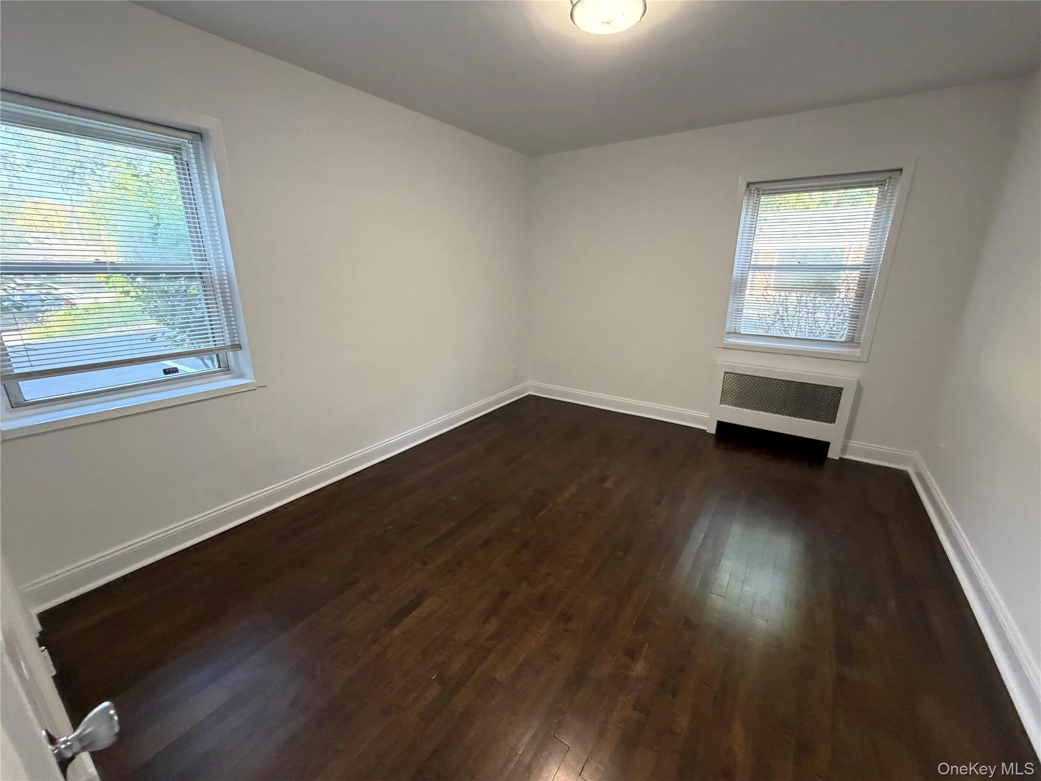 Good sized primary bedroom with ceiling lighting. Good sized primary bedroom with ceiling lighting.