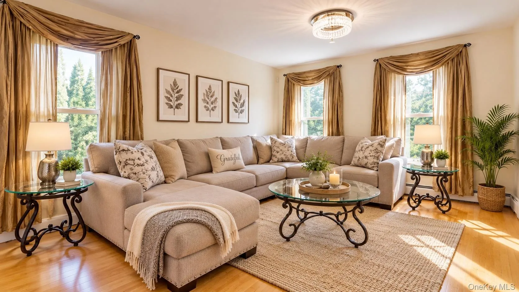Hardwood flooring throughout, recessed lighting, and a crystal chandelier Hardwood flooring throughout, recessed lighting, and a crystal chandelier