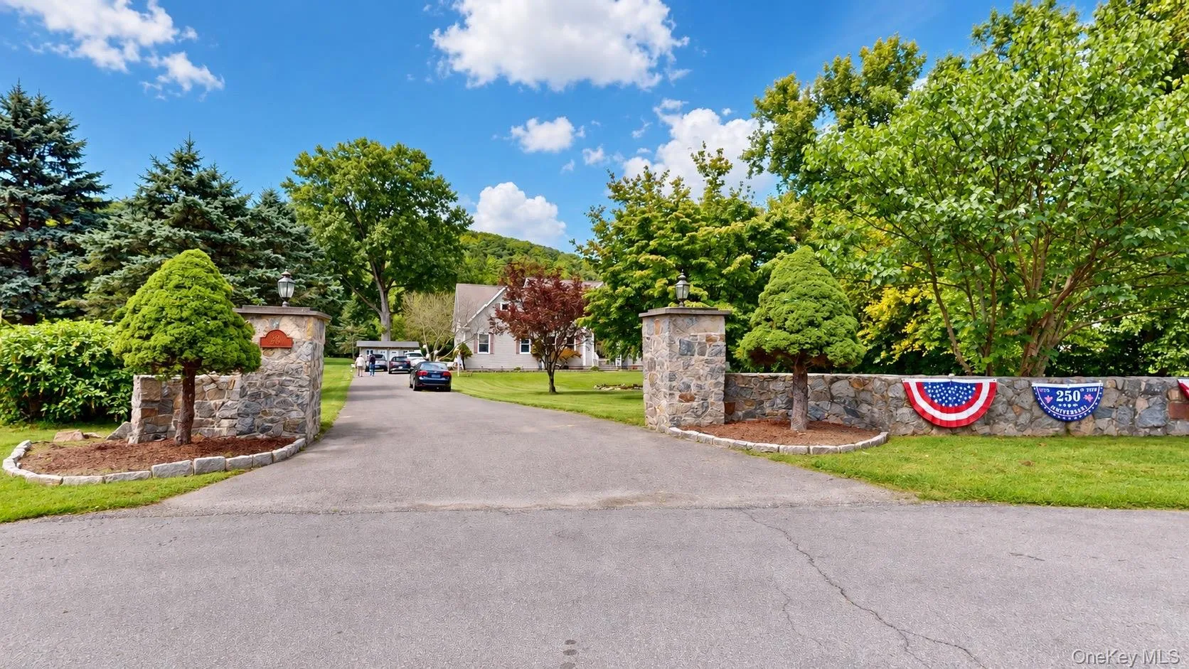 Stone pillar entrance with integrated lighting Stone pillar entrance with integrated lighting