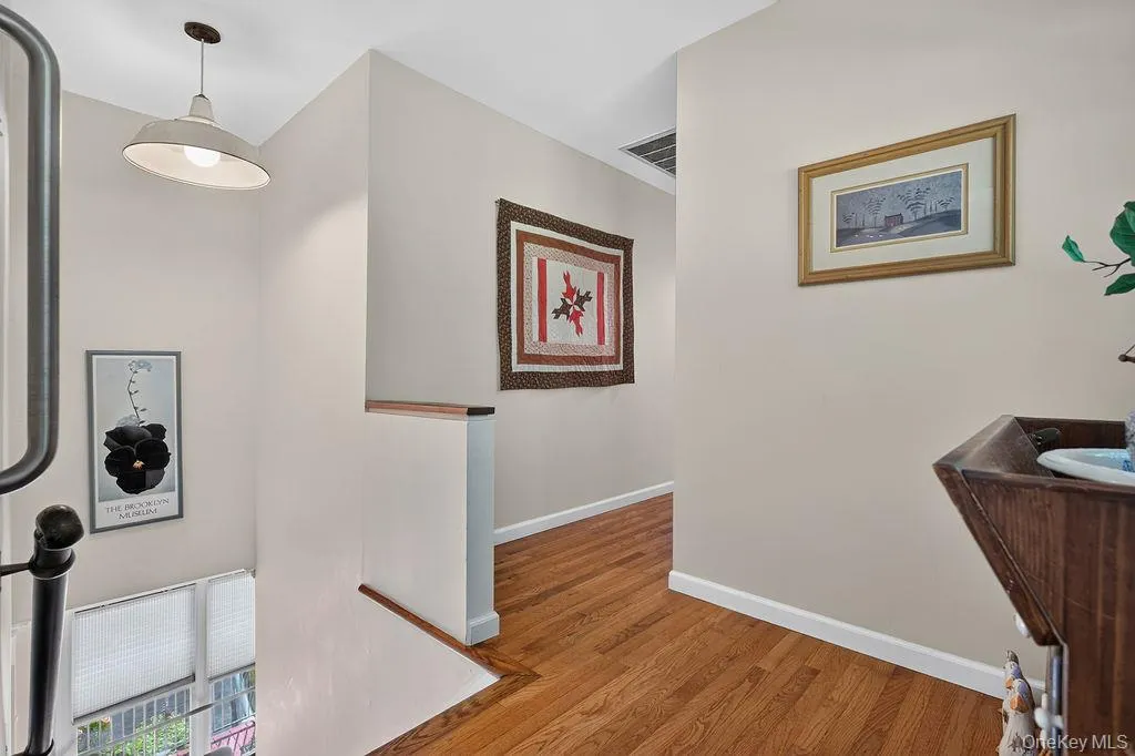 Sunlit second story hallway. Stair Chair Lift removed for photo Sunlit second story hallway. Stair Chair Lift removed for photo