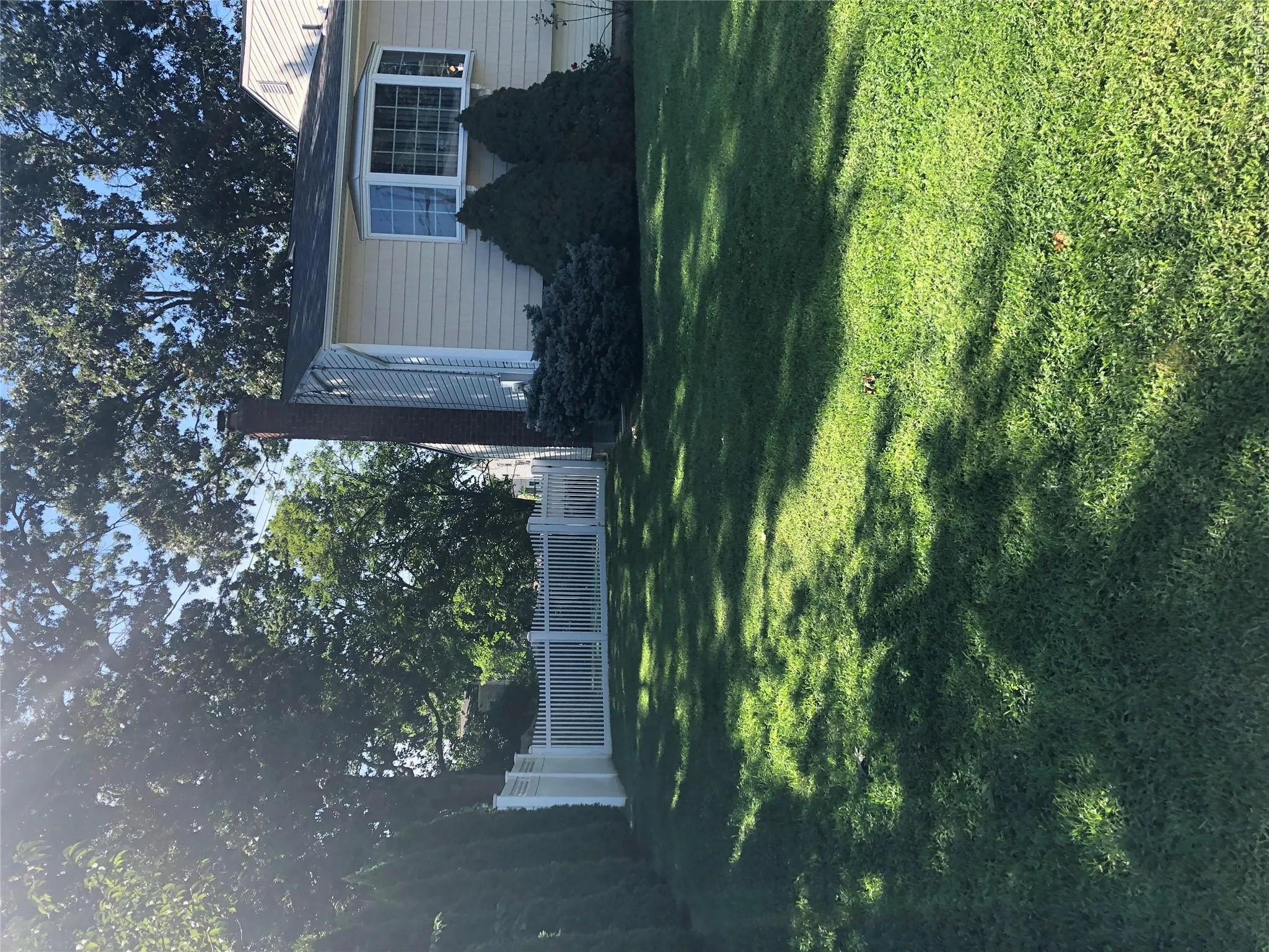 front of house entering side yard front of house entering side yard