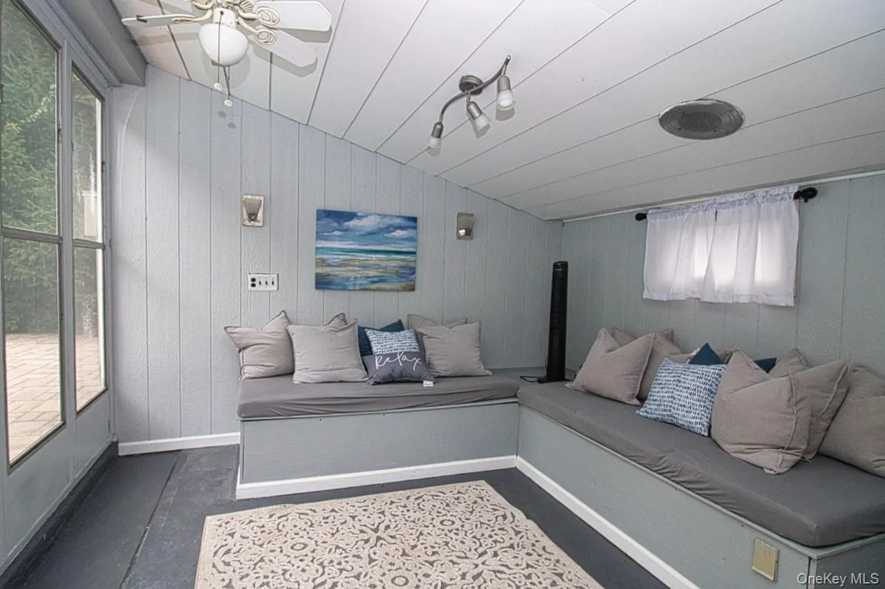 Pool House- this is the lounging. room. There is also a 1/2 bath, and a kitchenette. Pool House- this is the lounging. room. There is also a 1/2 bath, and a kitchenette.