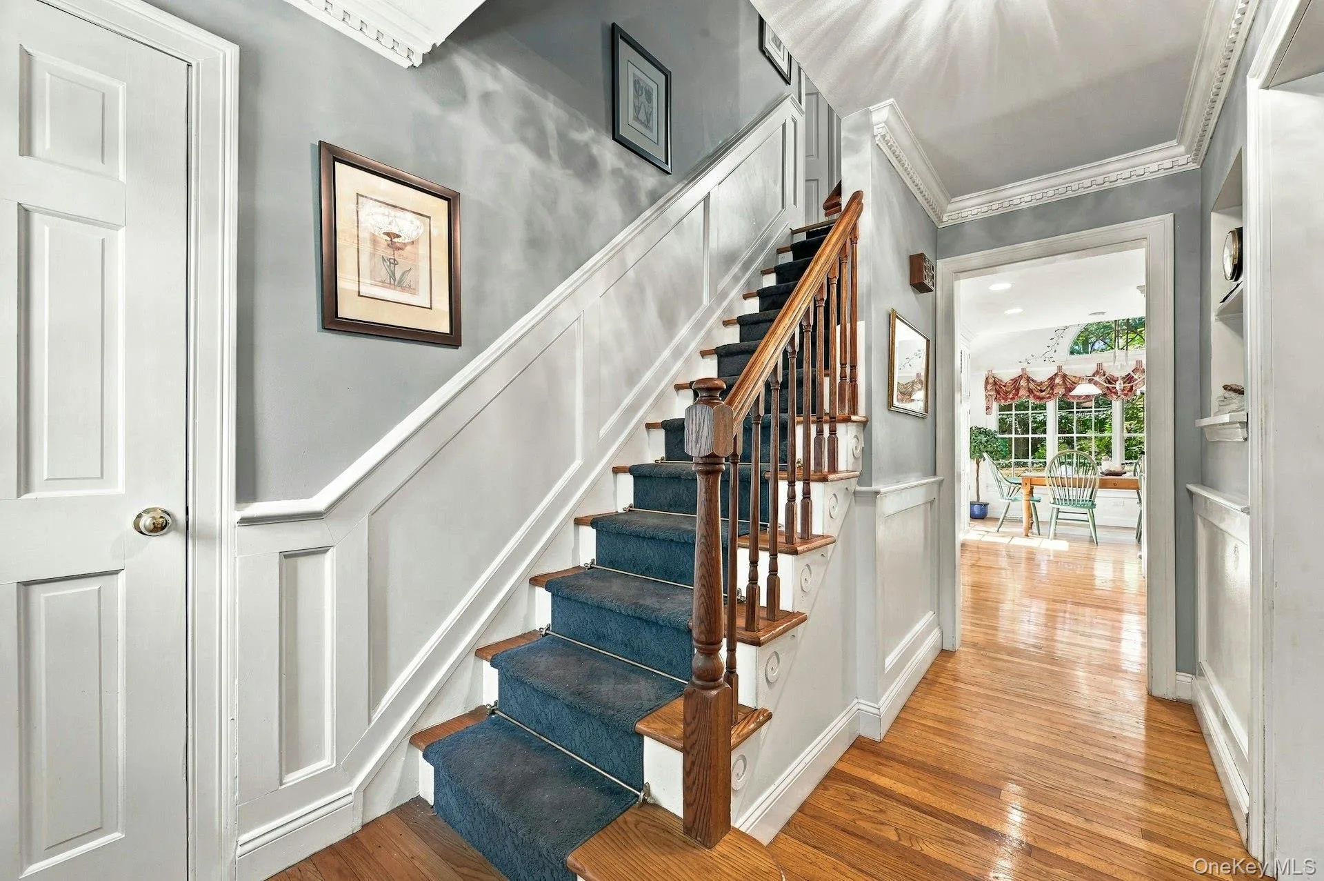 Entry foyer with stairs going to second floor Entry foyer with stairs going to second floor