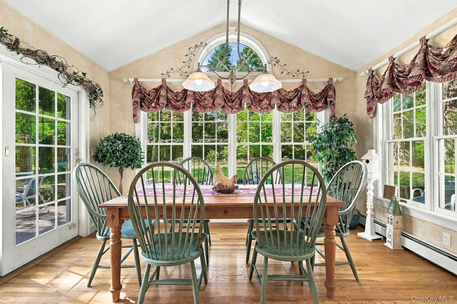 Spacious Dining area off of kitchen with beautiful windows Spacious Dining area off of kitchen with beautiful windows