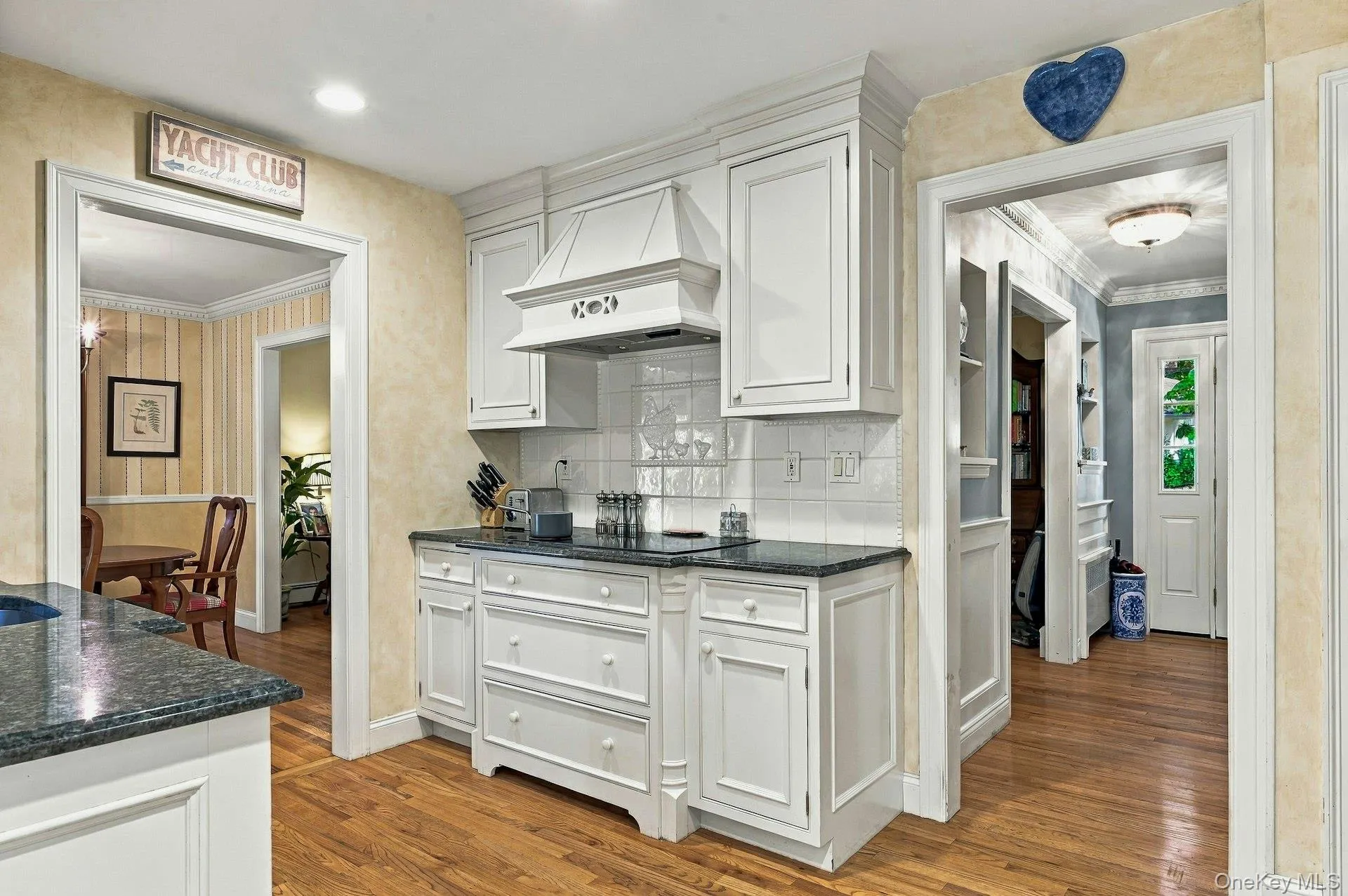 Thoughtfully designed, with hardwood flooring and opening into dining room. Thoughtfully designed, with hardwood flooring and opening into dining room.
