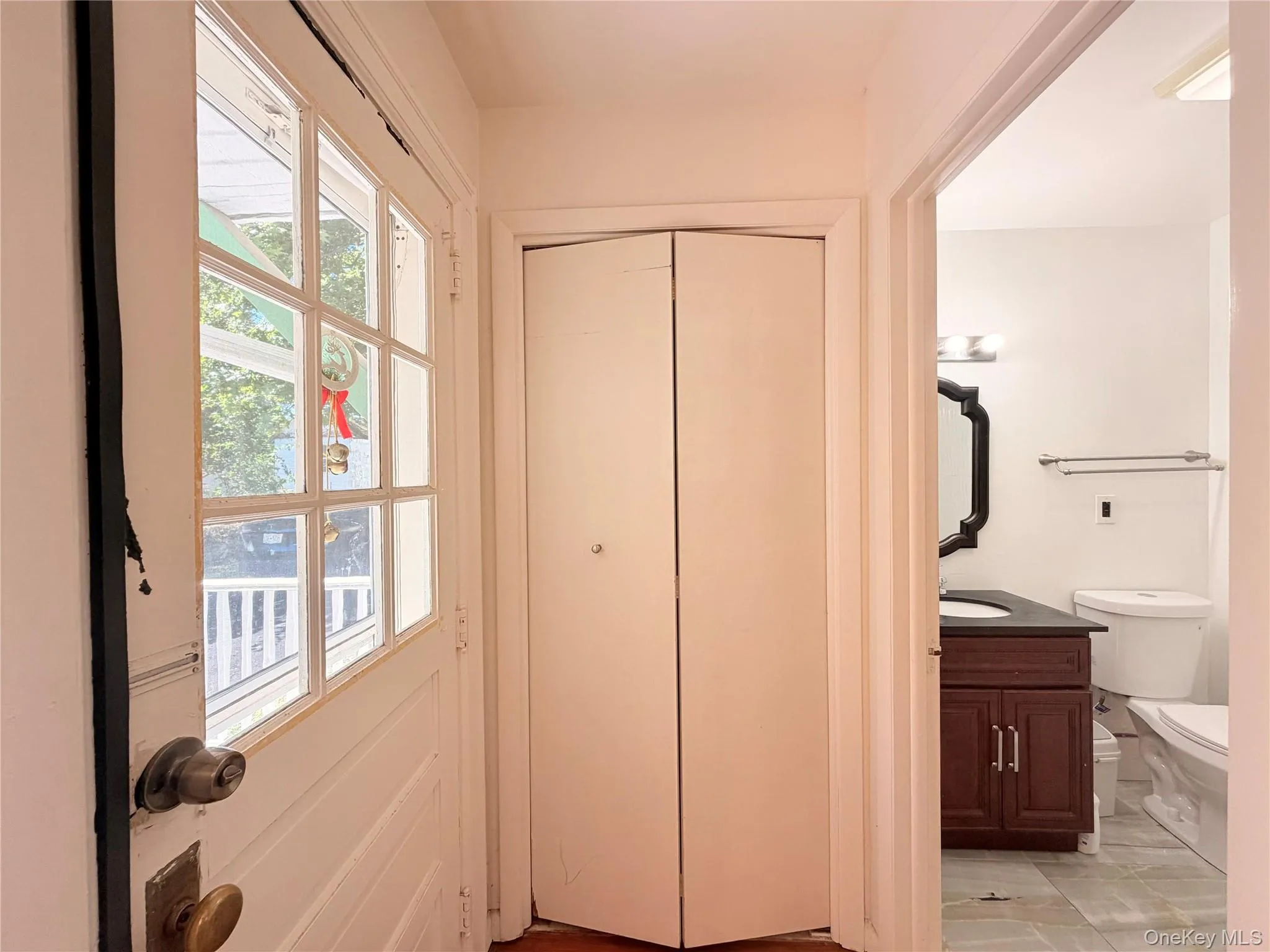 Side door off from the dining room and the 1st floor full bath Side door off from the dining room and the 1st floor full bath