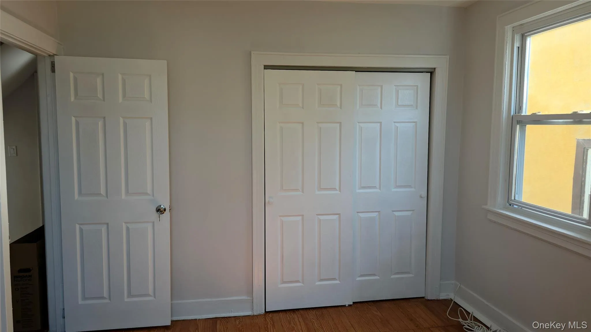 Double closets with Side window large room Double closets with Side window large room