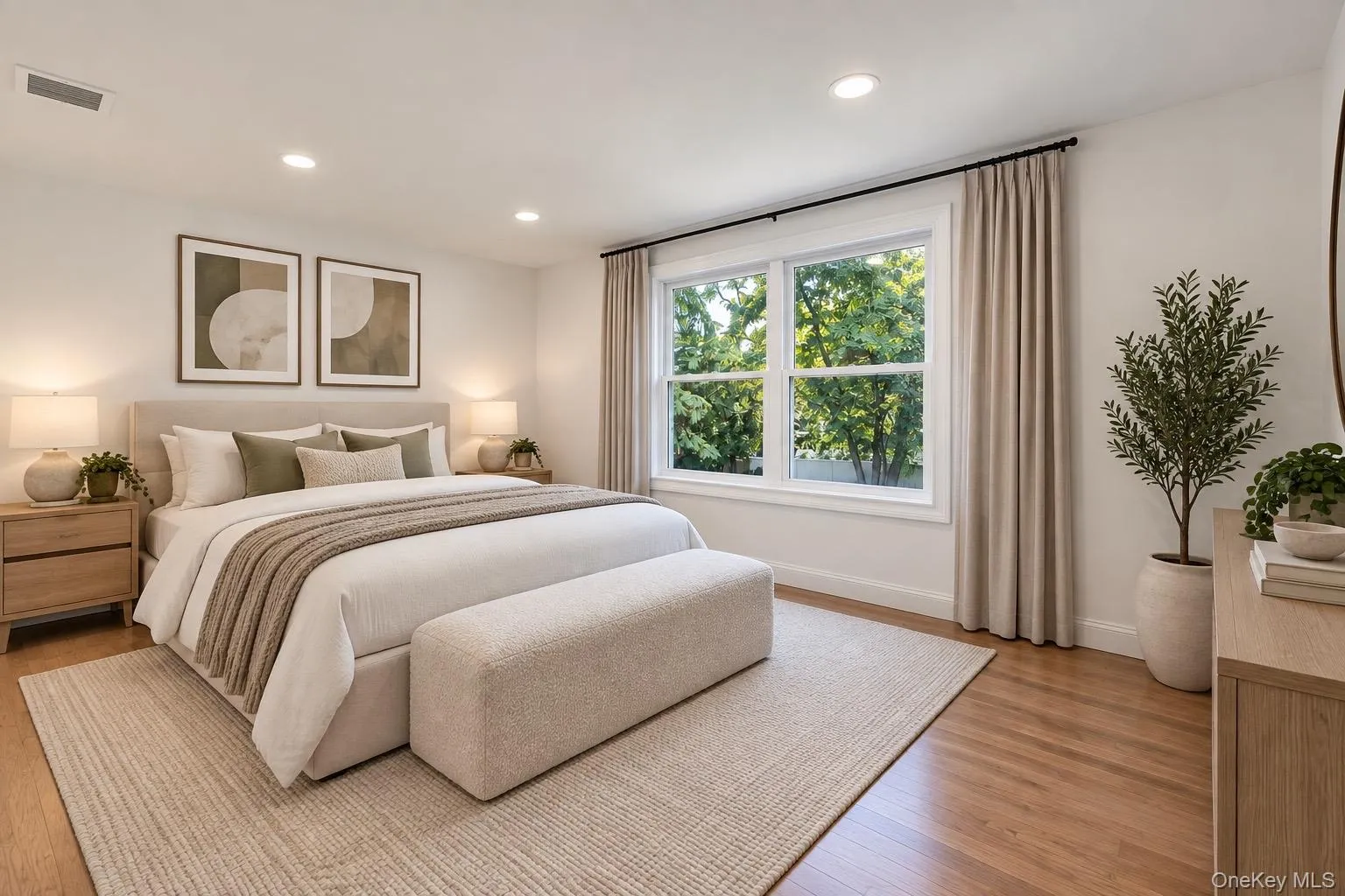 Virtually staged bedroom with white oak floors throughout. Virtually staged bedroom with white oak floors throughout.