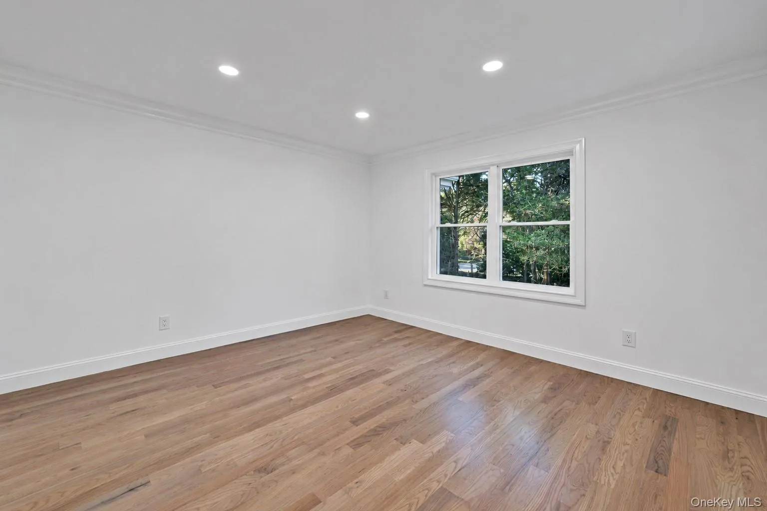 Recessed lighting, crown molding, double-hung window, wood-finish flooring Recessed lighting, crown molding, double-hung window, wood-finish flooring