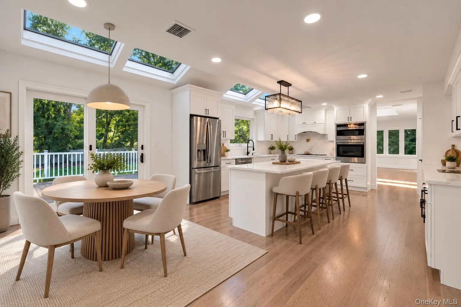 Kitchen with eat in space and barstools. Kitchen with eat in space and barstools.