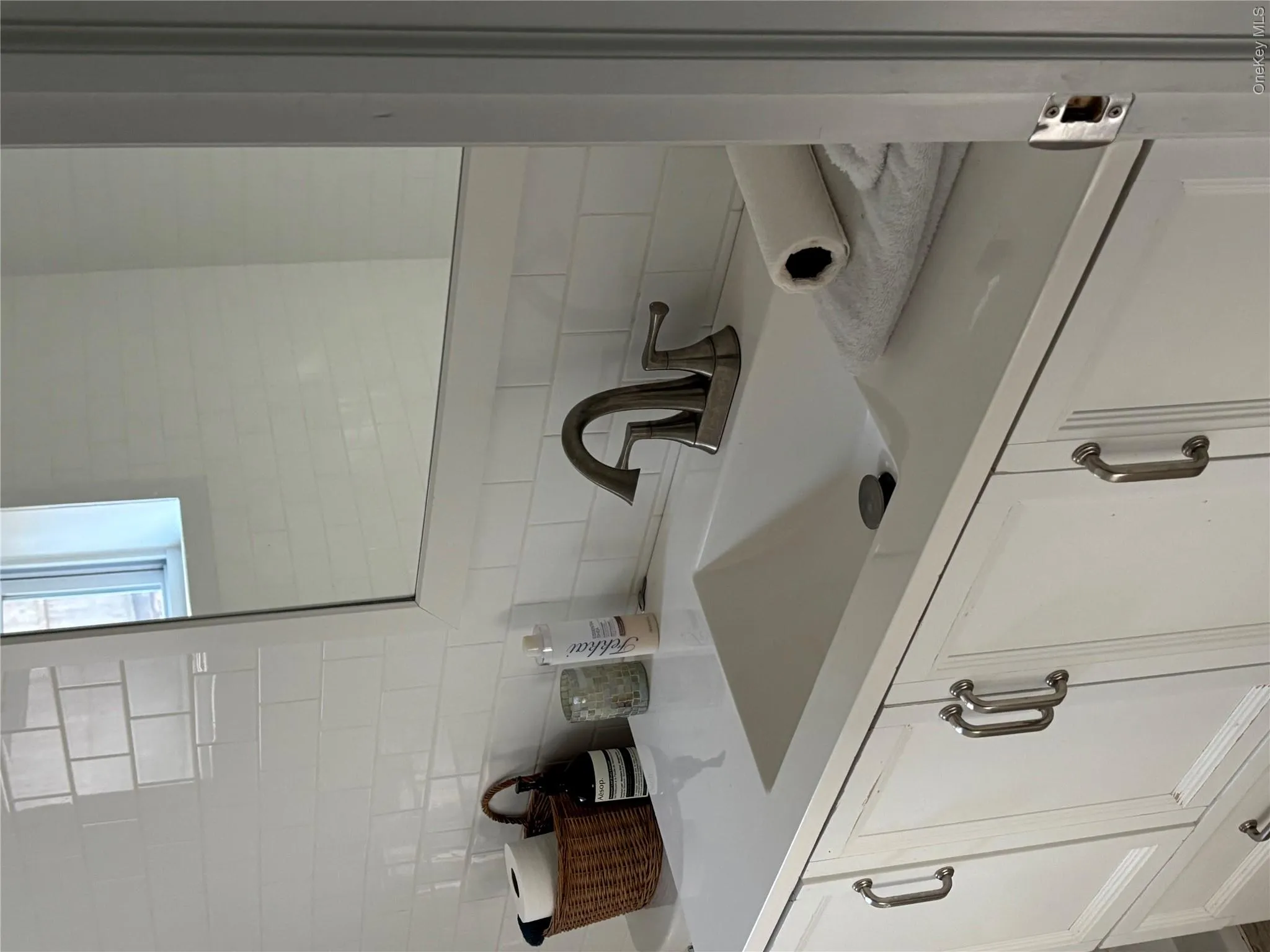 Bathroom with vanity and backsplash Bathroom with vanity and backsplash