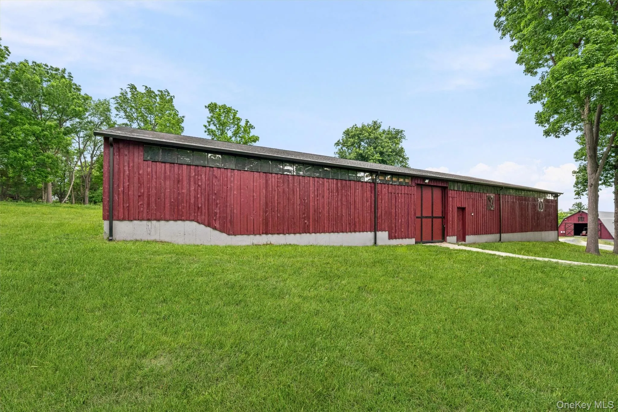 Indoor Riding Arena and Barn Indoor Riding Arena and Barn
