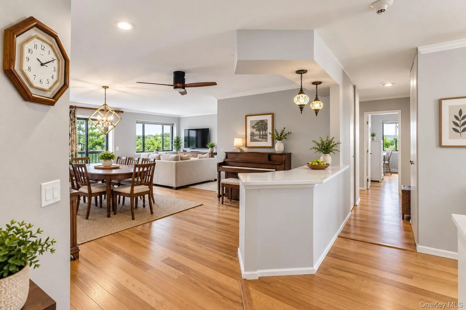 Hardwood flooring, recessed lighting, and crown molding Hardwood flooring, recessed lighting, and crown molding