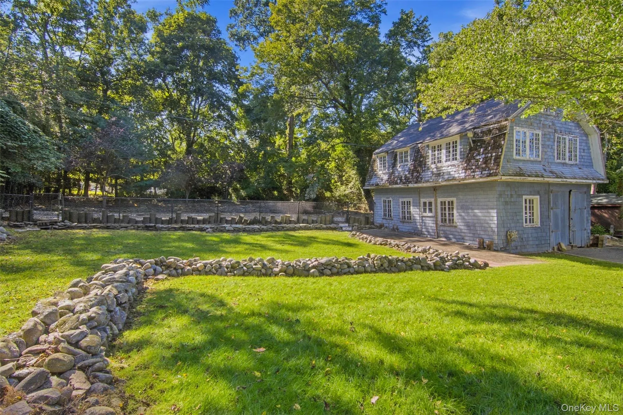 Backyard and detached garage/guest house Backyard and detached garage/guest house