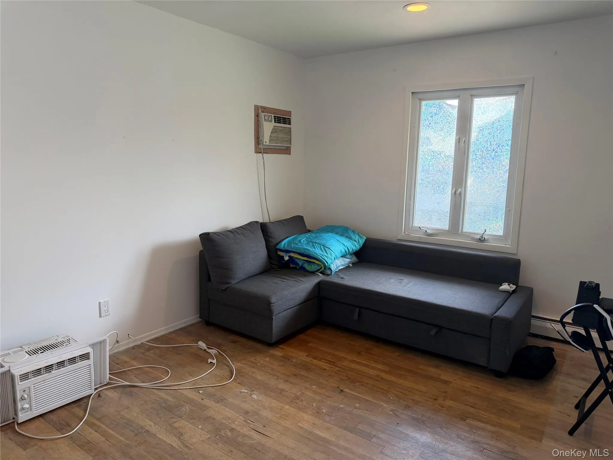 Bedroom wood floors and ample size closet Bedroom wood floors and ample size closet