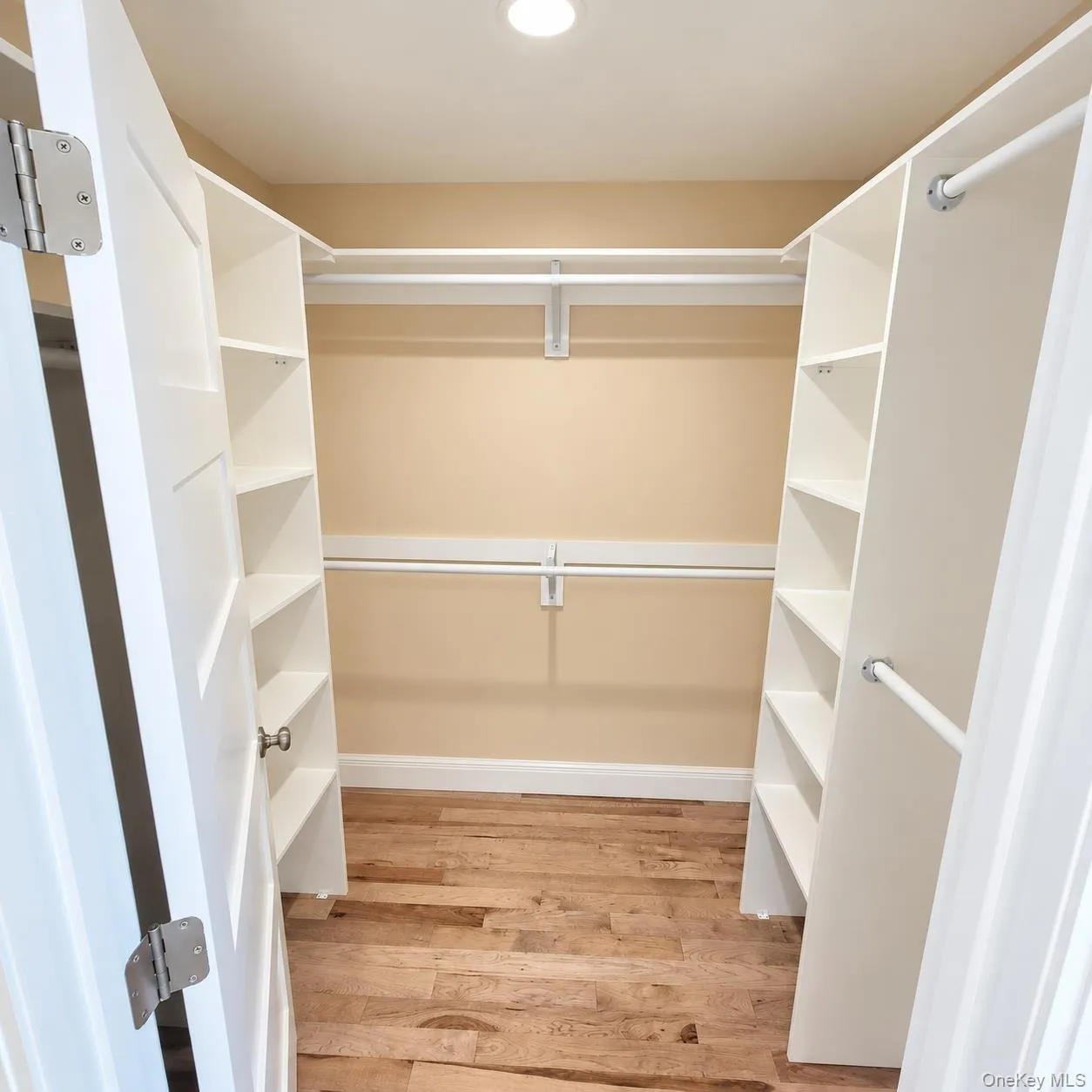 Primary bedroom walk in closet Primary bedroom walk in closet